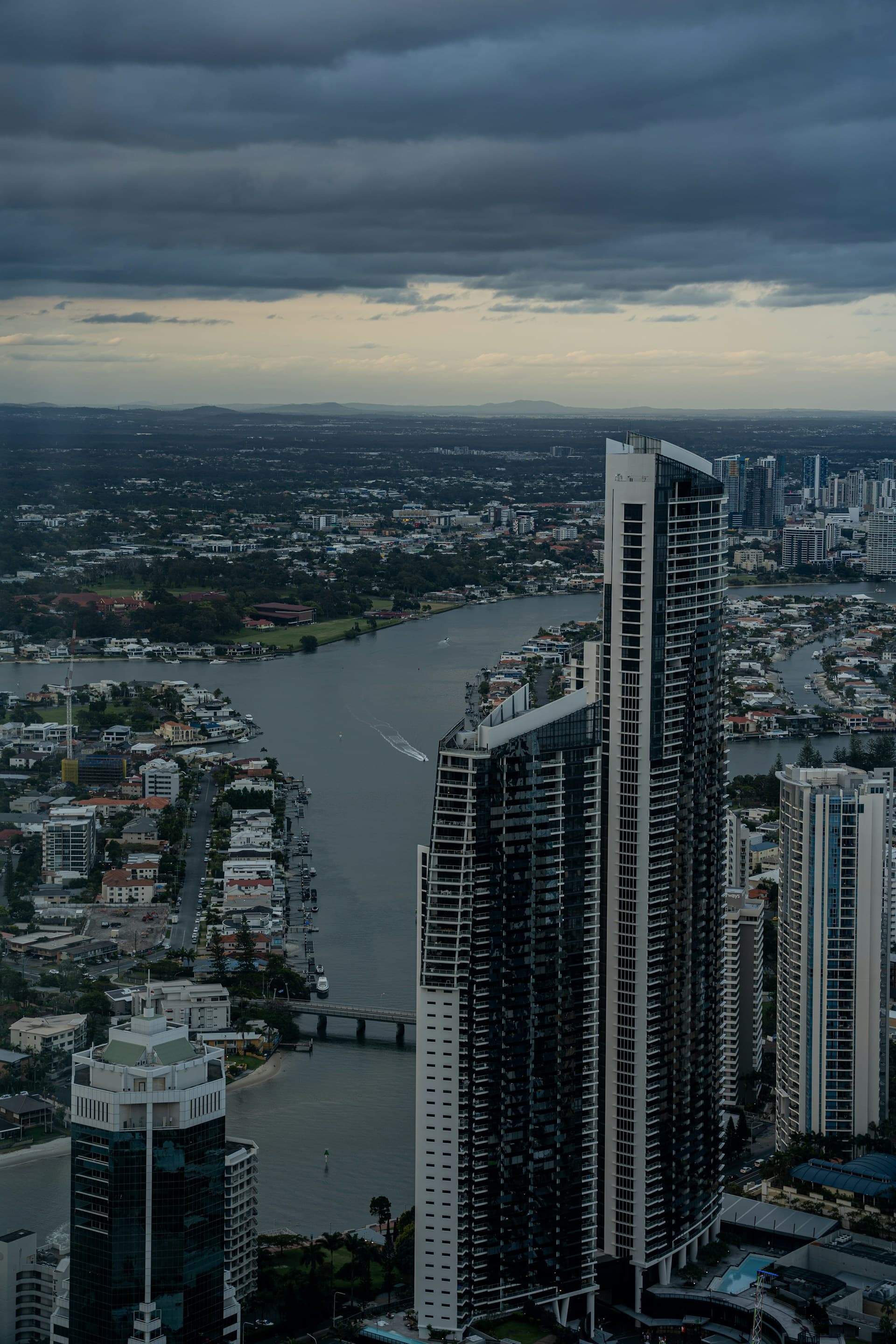 Gold Coast high-rise towers along the river at dusk